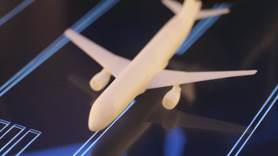 Animated GIF of an airplane over an animated runway